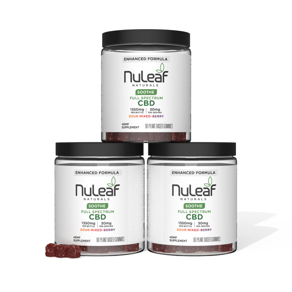 Three jars of NuLeaf Naturals Soothe Full Spectrum CBD gummies, sour mixed-berry flavor, stacked together with black lids and white labels.
